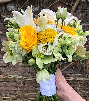 Yellow bouquet with yellow roses and lilies 