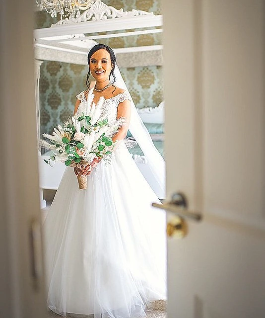 Bride with white bouquet 